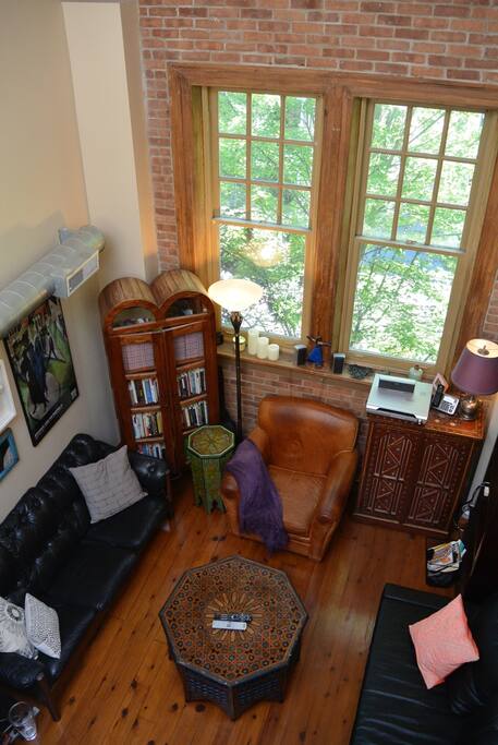 View of tall picture windows in living room