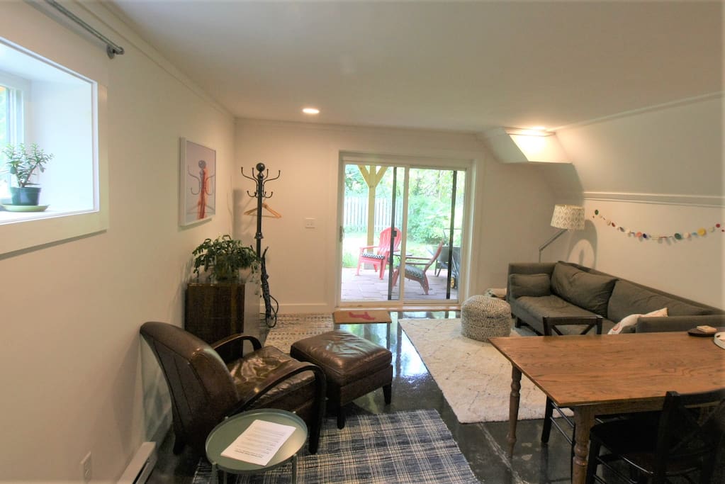 Sliding doors open to the private back yard and patio--perfect for listening to the birds while sipping your morning coffee!