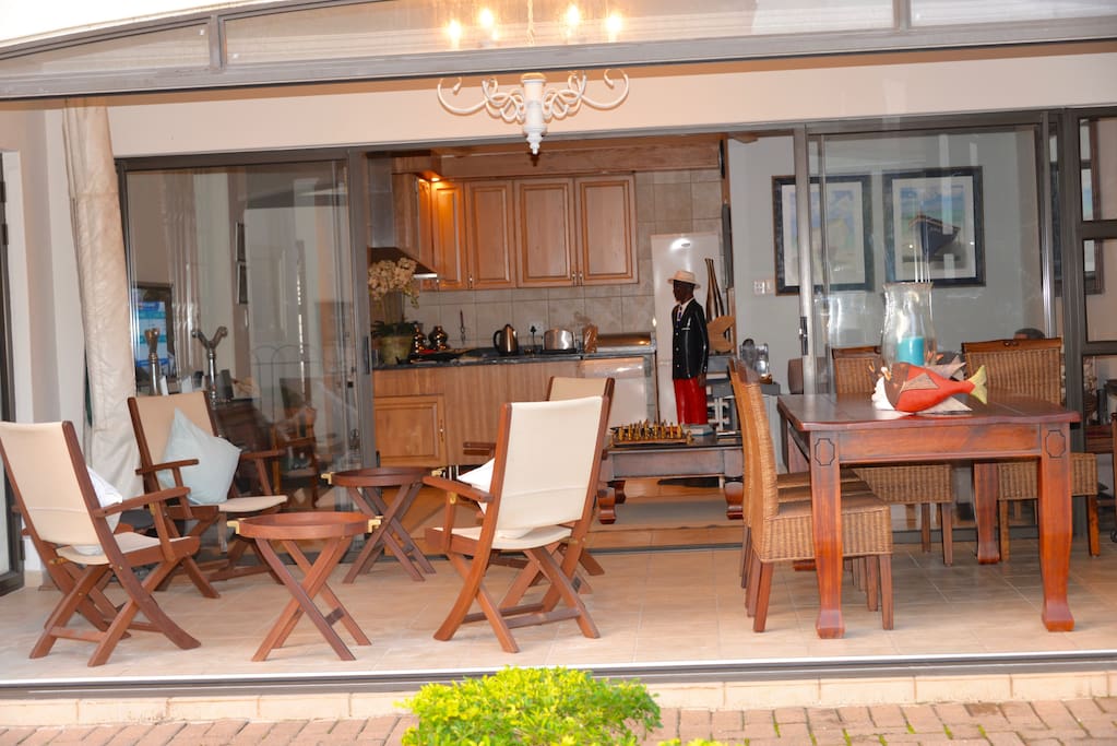 Comfortable patio with fold back glass doors