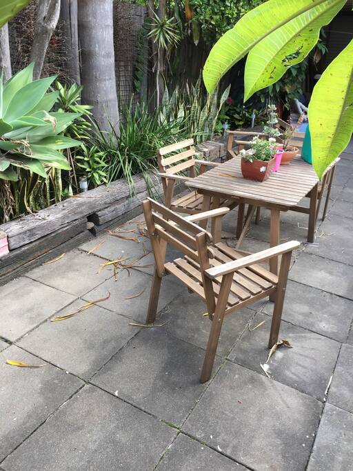 Sunny back yard with BBQ