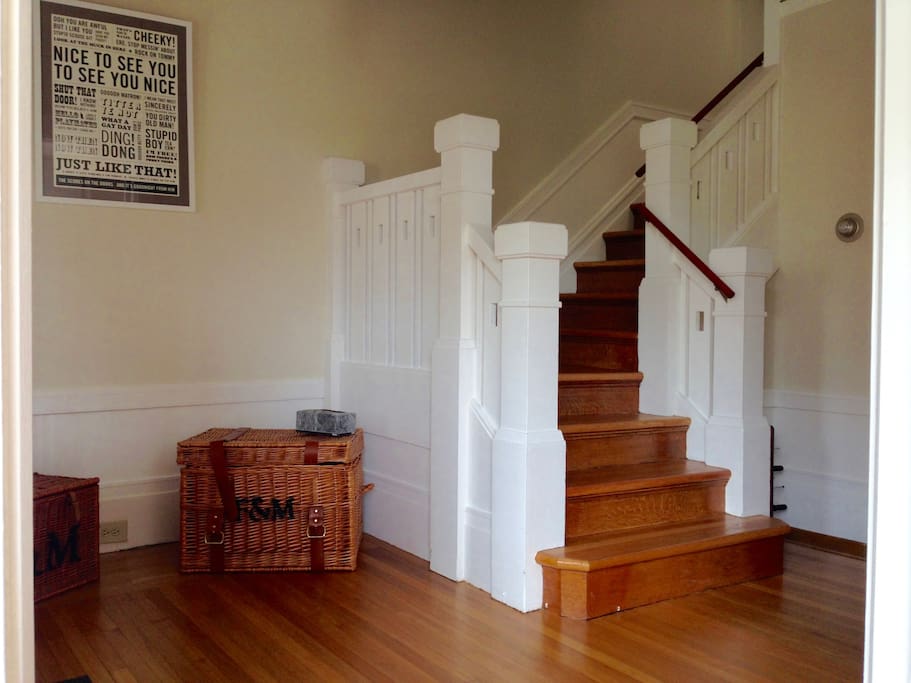 Spacious entrance hall and light filled Edwardian staircase.
