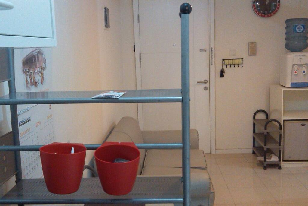 Living Area provided Water Dispenser and Mini Refrigerator