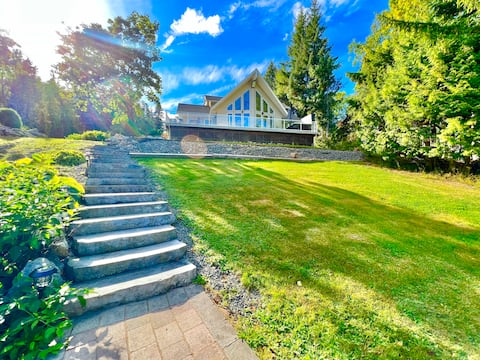 lakefront home with hot tub