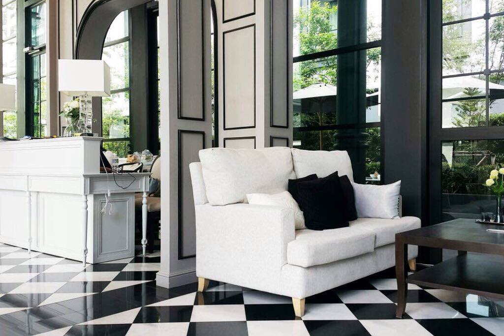 Elegant & comfort lobby lounge with receptionist and security..