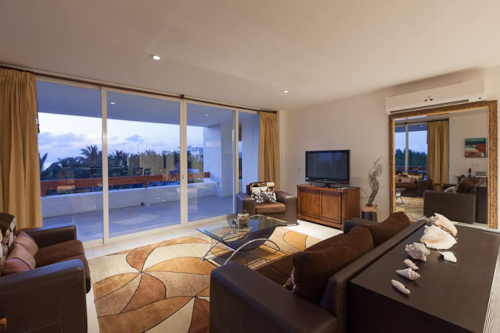Living room with wrap-around terrace