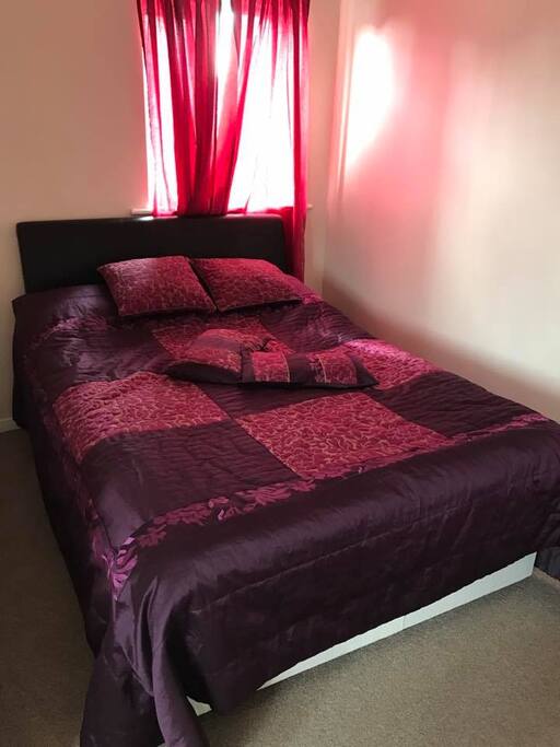 The bedroom with a double bed
