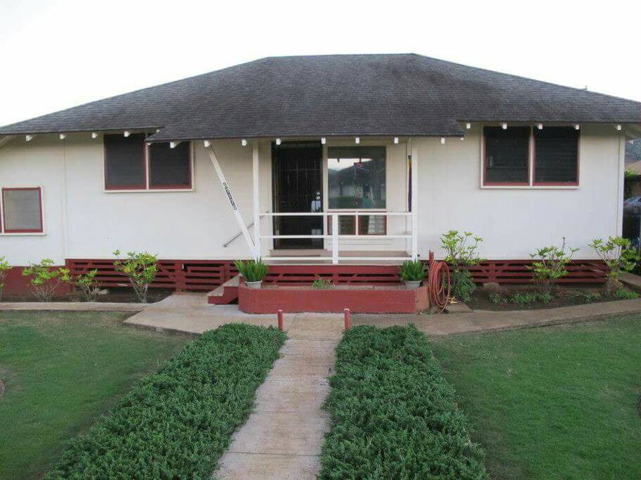 The front of the home. You'll park on the side, under the carport