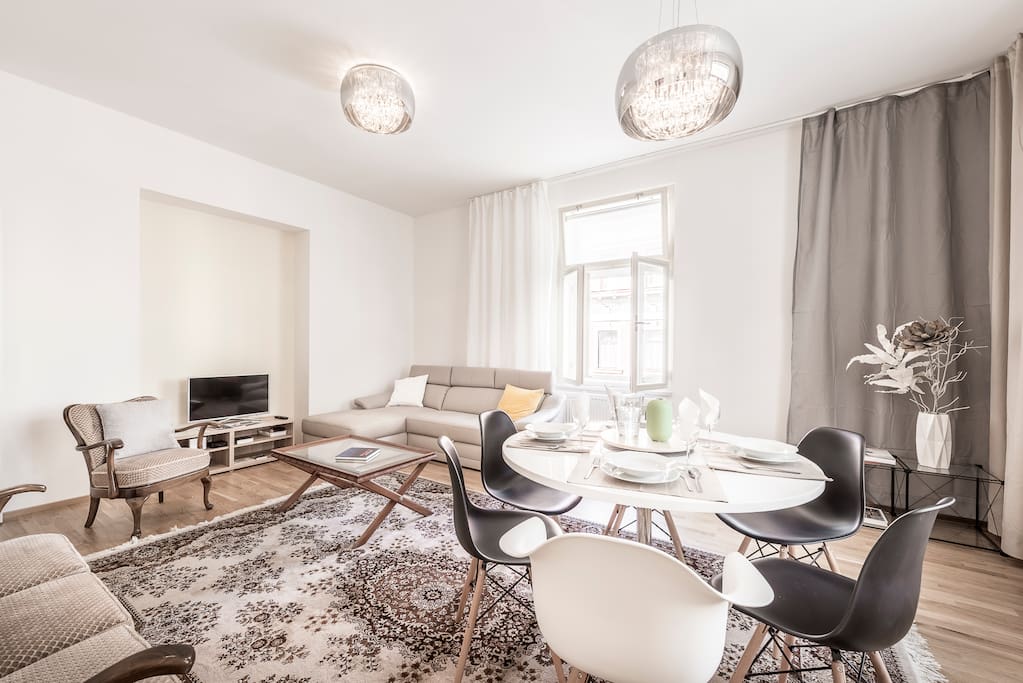 Living room with dining table and TV