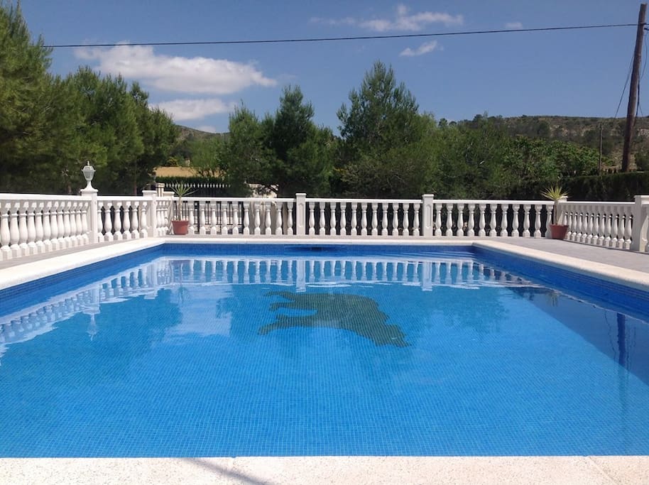 Access to large swimming pool within villa grounds