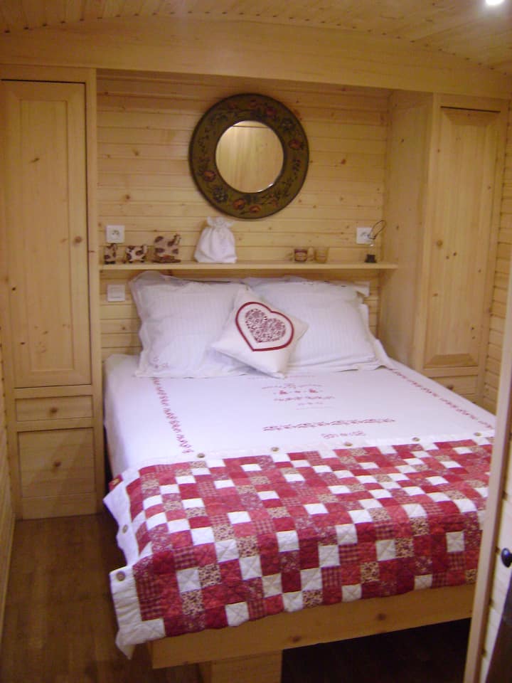 A single bedroom with plenty of storage and a 140 bed.
