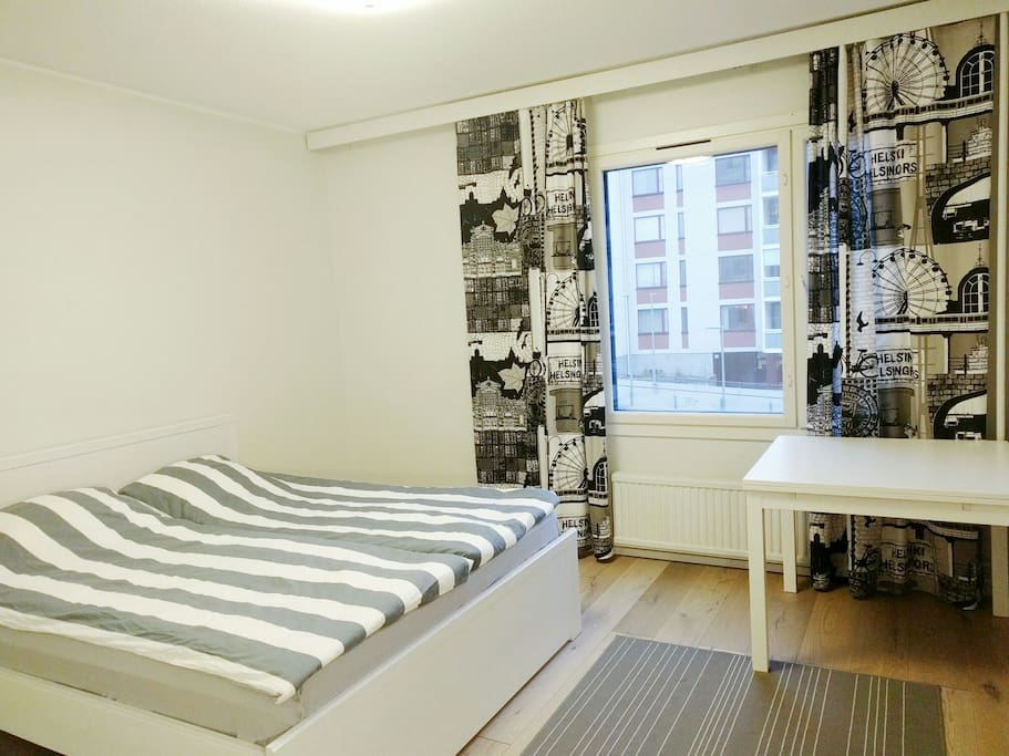 Bedroom. "It was clean, the beds are comfortable, and the balcony is really nice." (Guest)