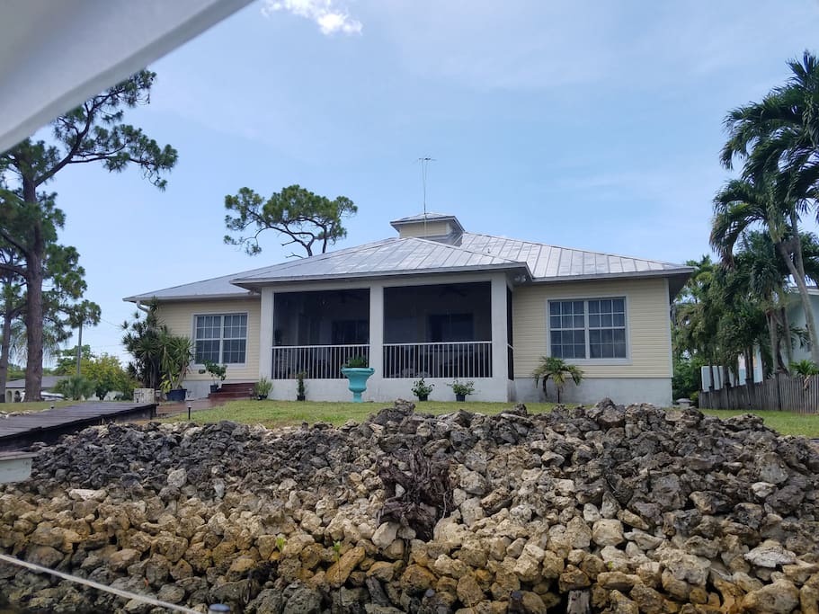 The back of the house, looking up from the canal