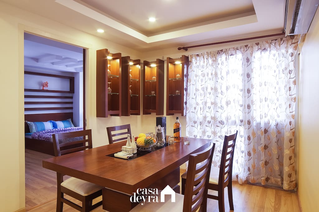 Dining area and master bedroom as viewed from the kitchen.