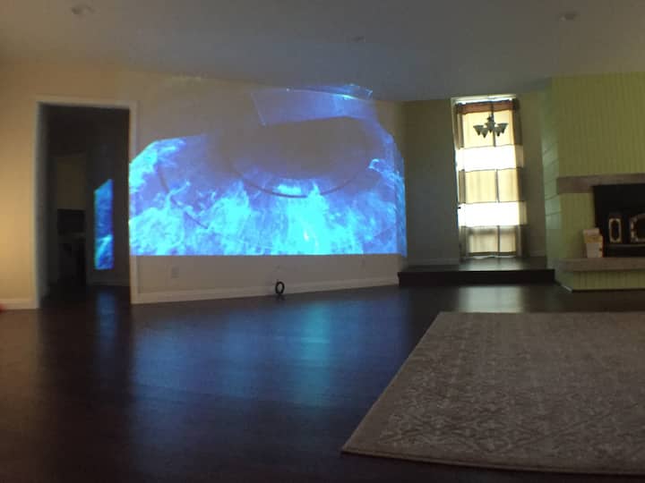 Spacious living room with movie projector 