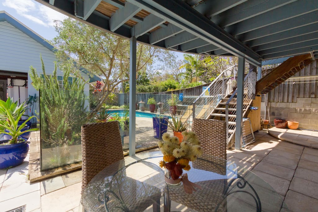 Outdoor dining with pool view