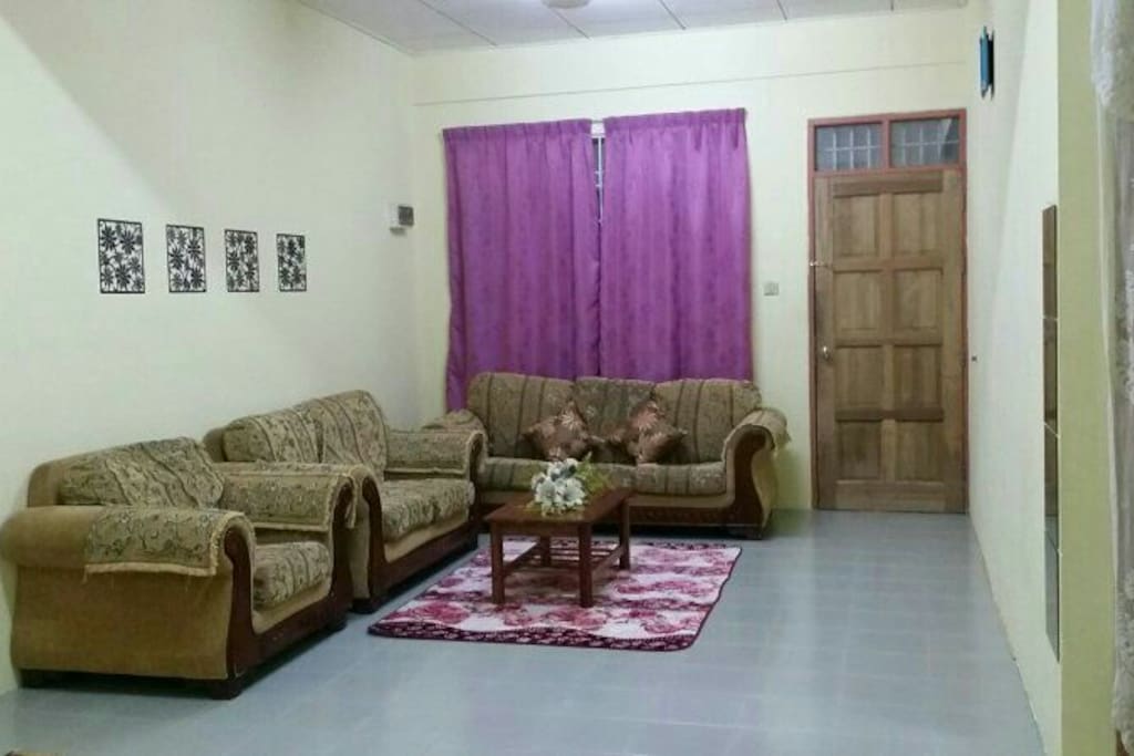 Living room view with sofa and coffee table. Very comfortable. Can acommadate more than 10 person.