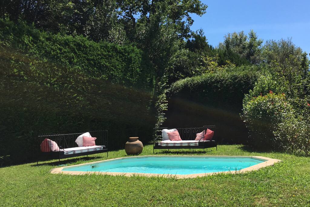 Garden with pool and daybeds