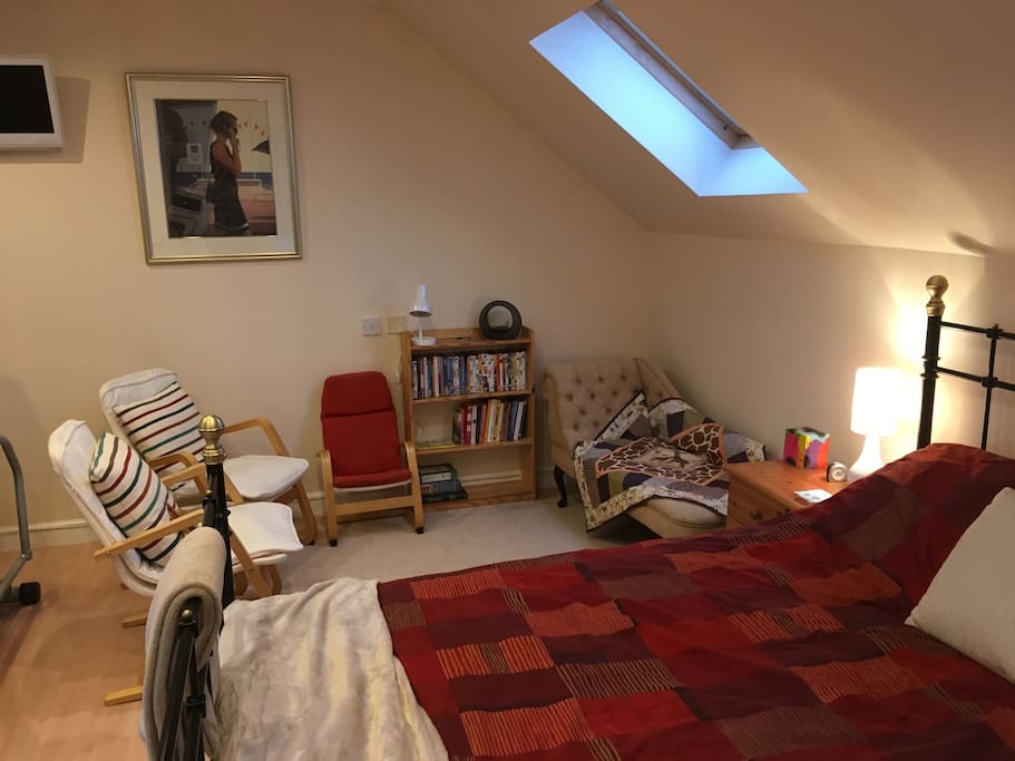 Family room, twin beds in alcove. Seating area.