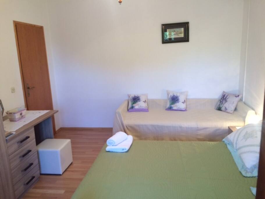 Bedroom with large bed (opposite view)