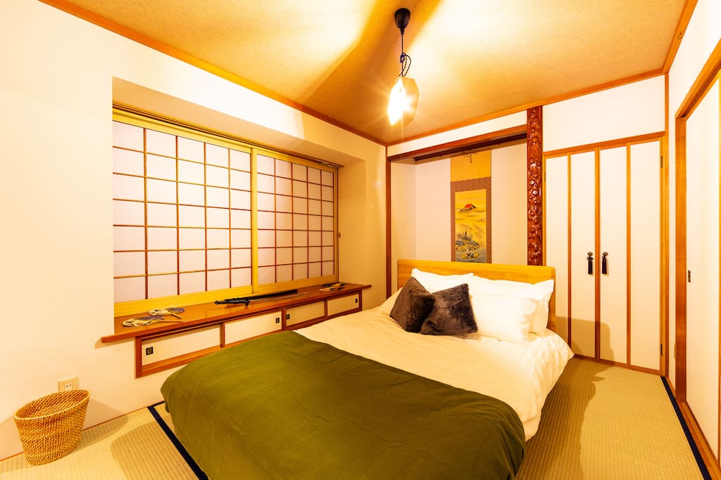 This is the SAMURAI styled bedroom. Decorated with Japanese sword (katana), hanging scroll, folding fan, all of which represent the Japanese traditions and cultures. This room is pouring with a Japanese ambience.