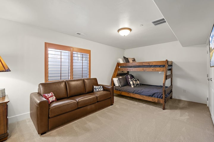 Bunk bed and sofa bed in downstairs living area