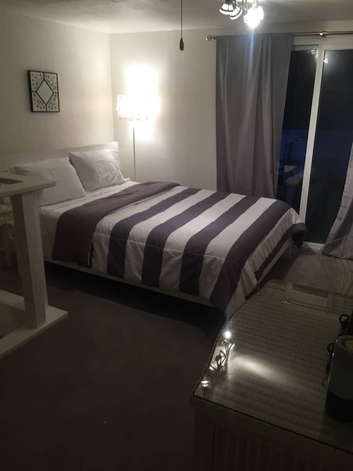 Bedroom. Soft sheets, comforter & 4 pillows. Closet has hangars. Room has dresser as well. 