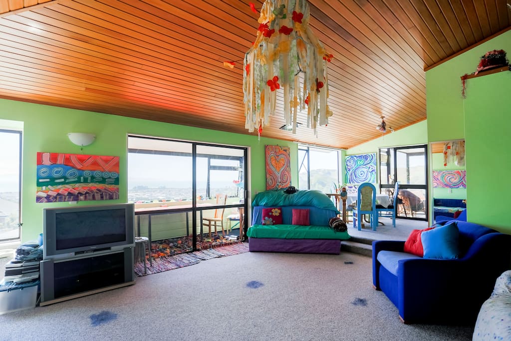 Spacious living area to chill out in with just a touch of colour