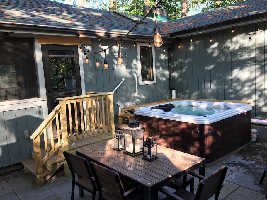 Outdoor patio with hot tub spa