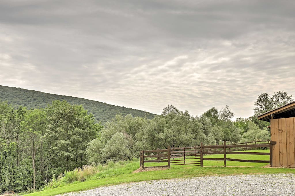 Relish the home's vast private land and unbeatable mountain views!