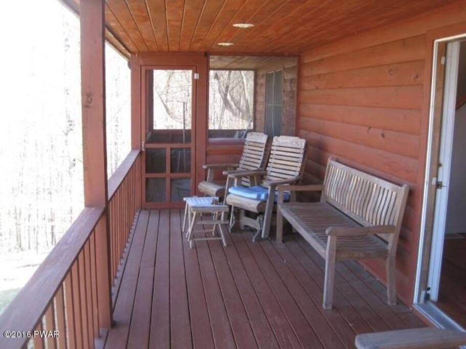 Front deck overlooking river and mountain, River rapids are audible.