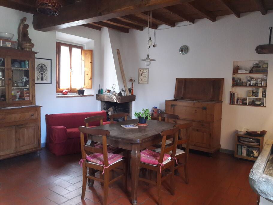 Our kitchen, and living room. You can find traditional details of the Tuscan style like the "cotto" floors and "pietra serena" sinks