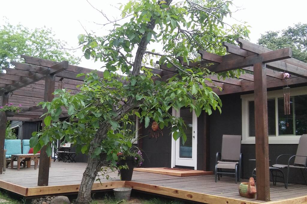 Front door and spacious deck