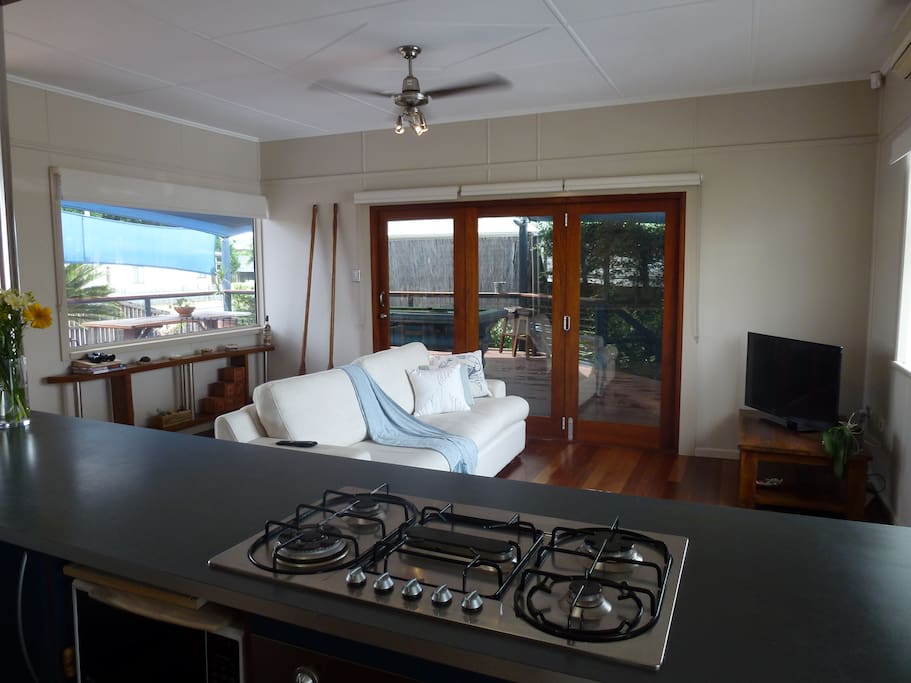 Open plan living out to the expansive deck