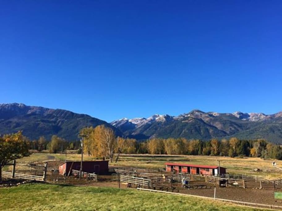 Bring your horses and ride our private acres or the trails in the nearby Wallowa Mountains. View to the southwest ~ the barns and land