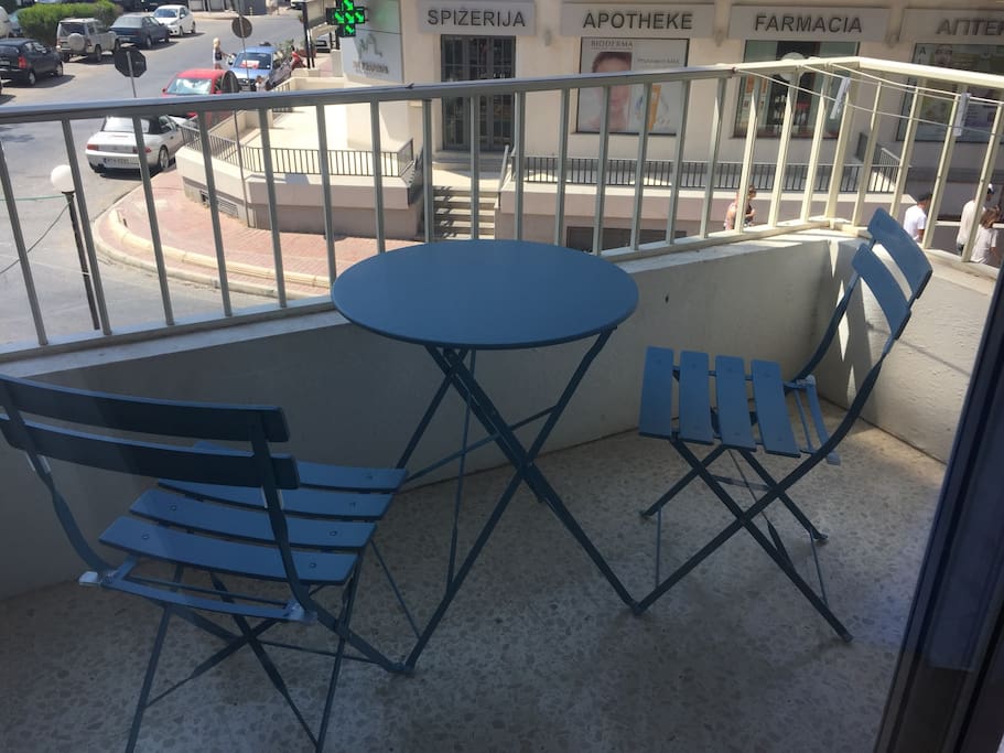 Balcony in central Qawra close to many shops, promenade and bus terminus.