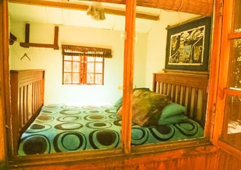 WOODEN CABIN DOUBLE BED SHARED ABLUTIONS COMMUNAL KITCHEN BRAAI AREA
