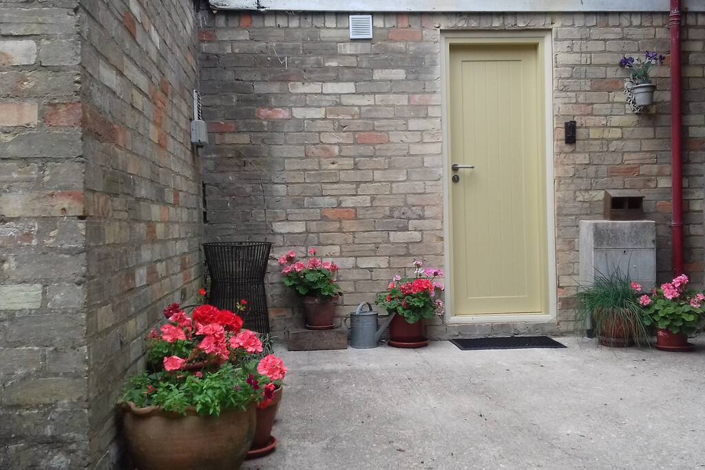 Cosy self contained studio apartment with an area for sleeping, a living area and a kitchen area. The only separate room with a door is the bathroom.