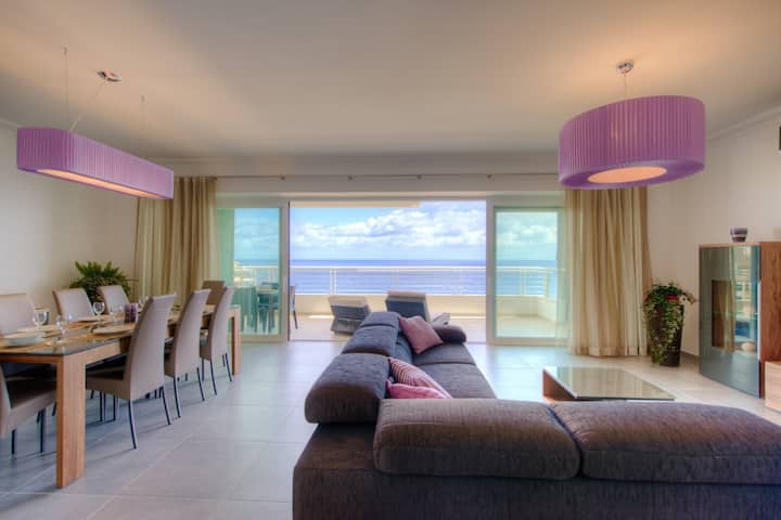 Open Plan living area with sea views and LCD TV