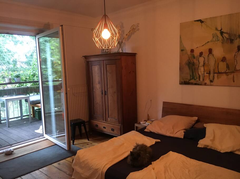 Schlafzimmer mit Balkon