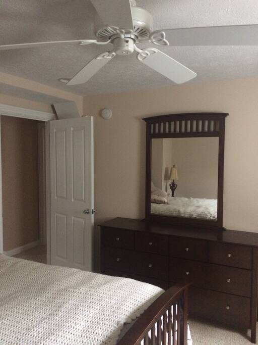A mirror and dresser is provided.