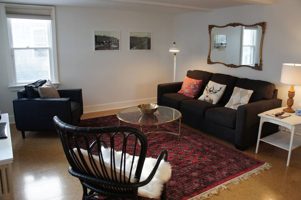 Open Concept Living Room with large, flat-screen TV