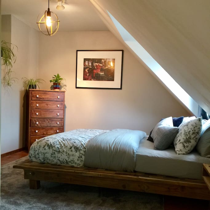Cozy sleeping area #1 with queen size bed. All natural premium mattress.