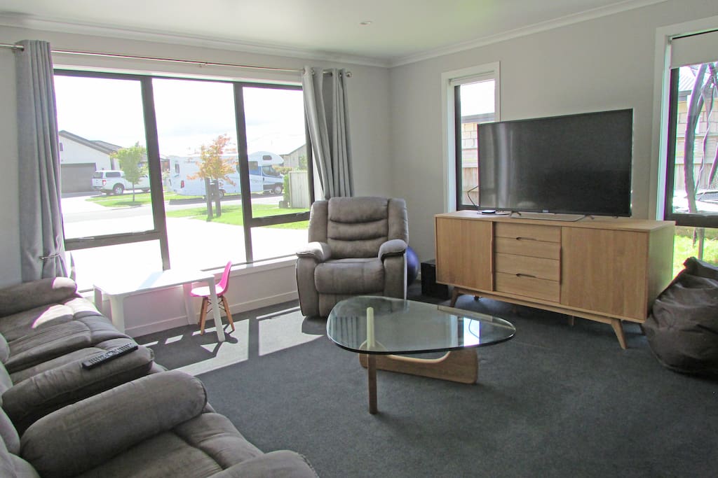 Second lounge with Netflix and doors that close off the main open plan living space