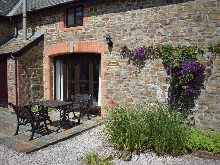 The Seating Area Outside Clematis Cottage