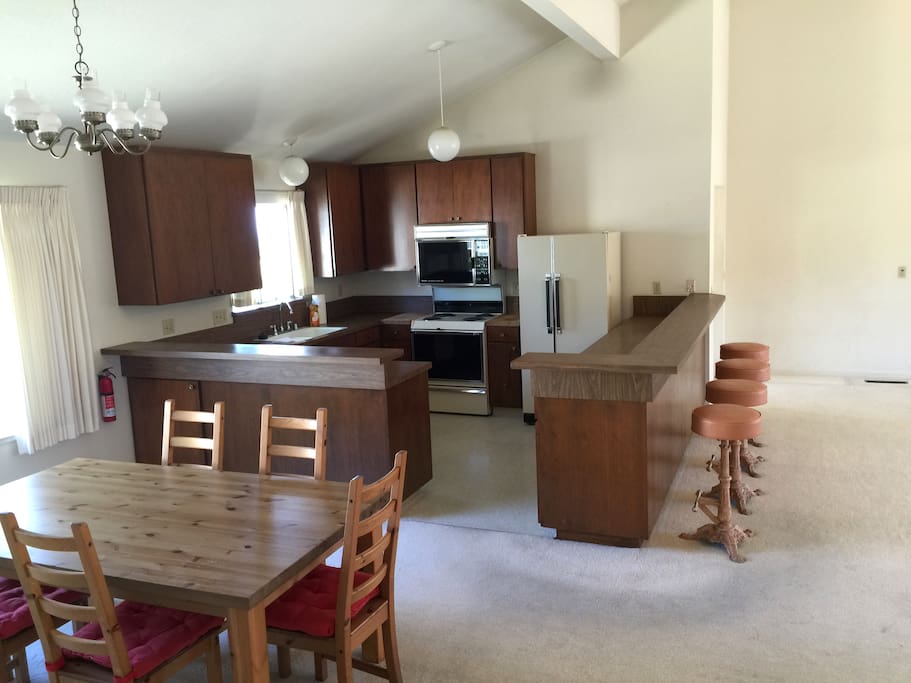 dining table, kitchen, and barstools