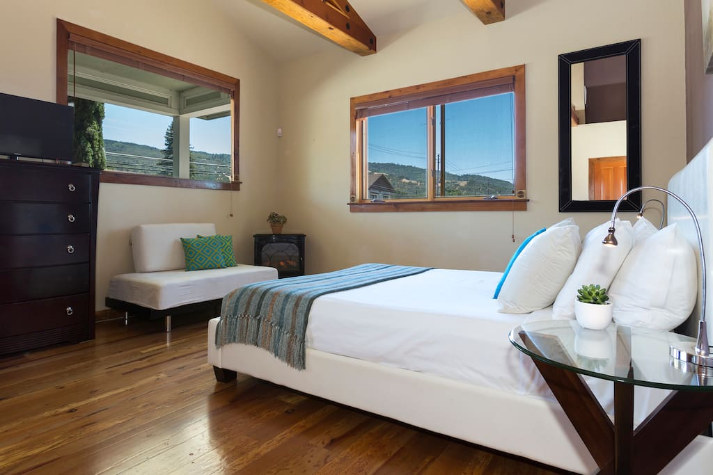 Mountains views and a cozy sitting space with fireplace.