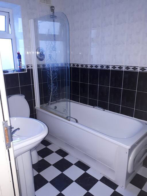 One of 2 bathrooms. This one has bath with inbuilt shower & is fully tiled. Second bathroom has an electric .