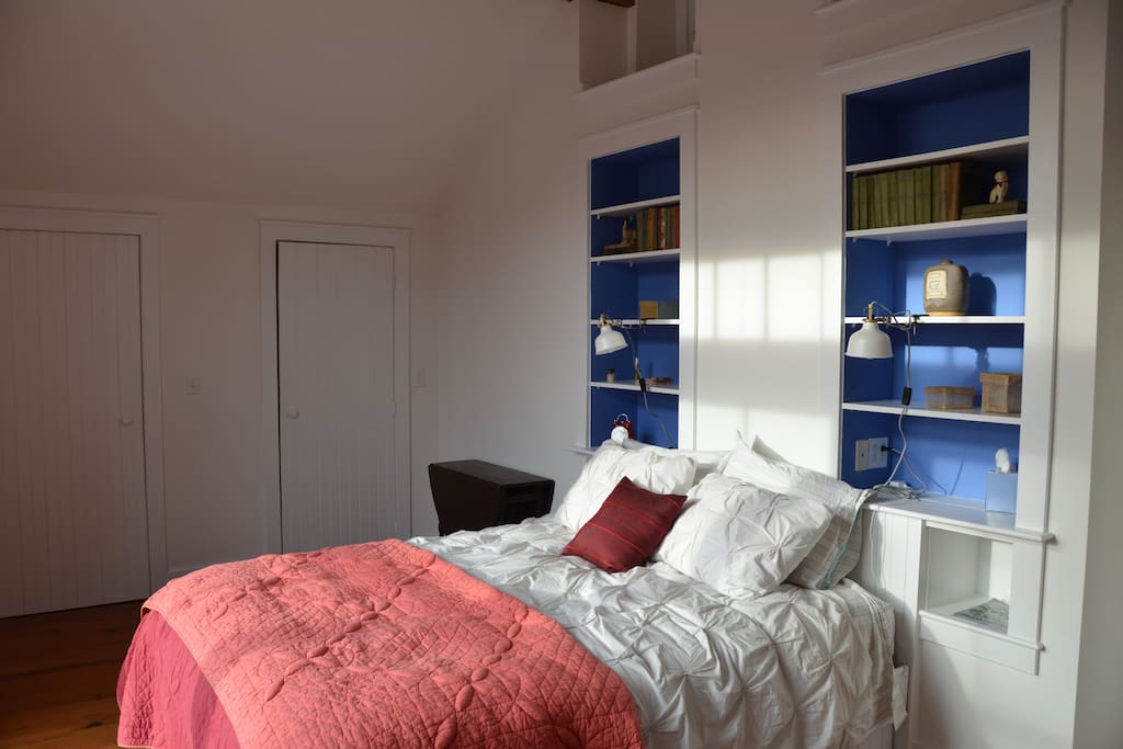 The built-in bookcases in the master bedroom