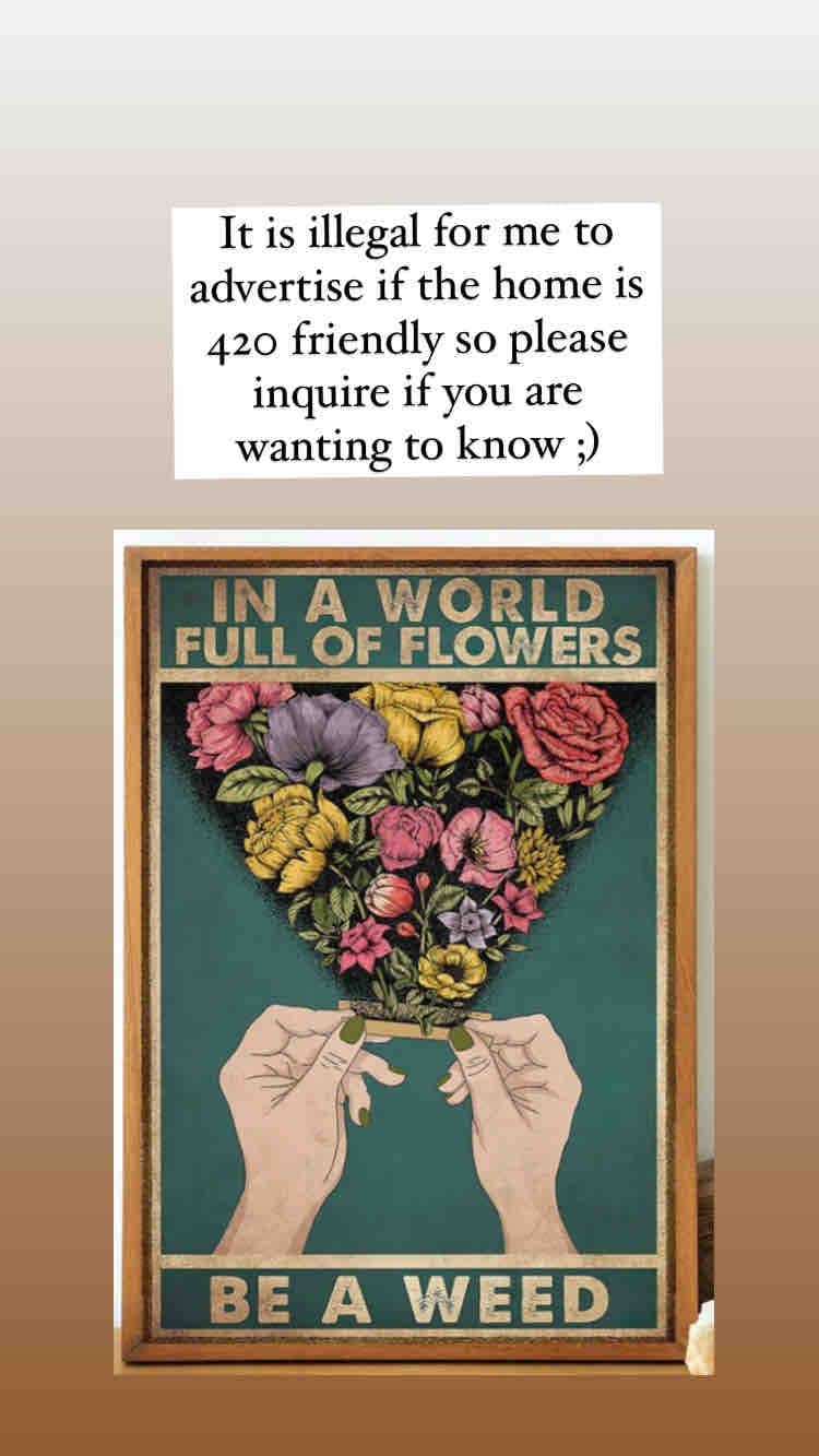 A flower-themed artwork is displayed, featuring a heart shape formed by various colorful flowers held between two hands. The background is a soft green-blue, while a message above the artwork is presented in a white box, emphasizing the home's 420-friendly policy.