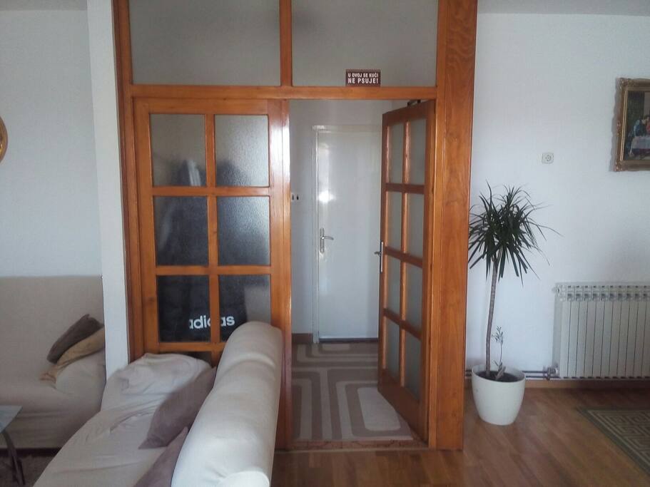 living room and the entry in the third and fourth bedroom